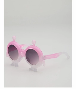Macro side view of pink gradient cartoon sunglasses for children with cute leg details