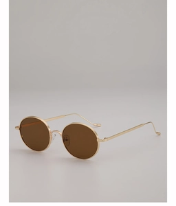 Vue latérale de lunettes de soleil rondes en métal doré avec verres marron