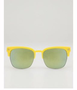 Détail de lunettes enfants demi-cerclées jaunes avec rivets dorés et verres colorés