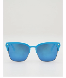 Détail de lunettes de soleil enfant demi-cerclées avec monture bleue et verres miroirs