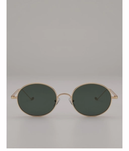 Vue détaillée de lunettes de soleil ovales dorées avec verres teintés et plaquettes