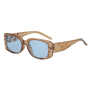 Brown geometric frame sunglasses with blue lenses and silver studs in a 45-degree view