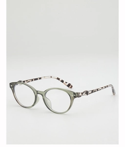 Detailed view of round sage green glasses frame with stylish tortoiseshell patterned temples