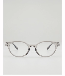 Detailed view of grey translucent cat-eye optical frames with metal rivet and leopard temple tips