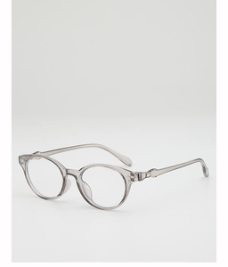 Detail of translucent grey frames with chic metal diamond rivets on minimalist sunglasses