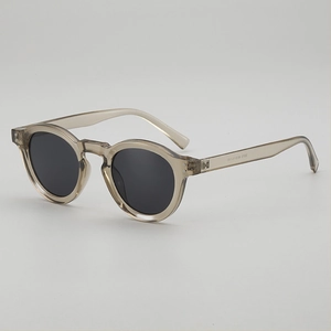 Retro round champagne transparent frame sunglasses with dark grey polarized lenses