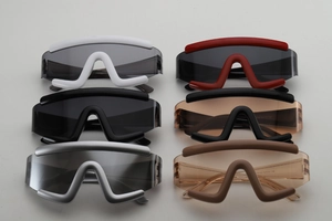 Flat lay of multiple chunky wave frame outdoor sports sunglasses in various colors