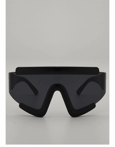 Detail of oversized futuristic cycling sunglasses with black frame and unique V-shaped cut