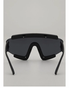 Detail view of large shield sunglasses featuring black resin frames and metal screw accents