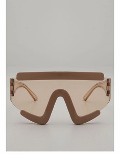 Front view of khaki futuristic oversized shield sunglasses with unique geometric nose bridge