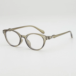 Minimalist round translucent grey frame sunglasses with stylish diamond metal rivets