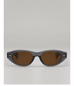 Detailed view of translucent smoke grey oval sunglasses with silver diamond metal hinges