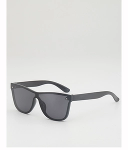 Close-up of stylish black flat top frameless sunglasses with large dark lenses for kids