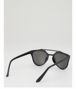 Detail view of black vintage double-bridge sunglasses for kids with UV protection