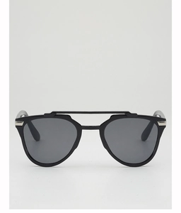 Close-up of black double-bridge sunglasses with silver metal decor and grey lenses