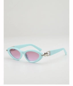 Detail of mint green cat-eye sunglasses with silver metal spike and chain temple accents