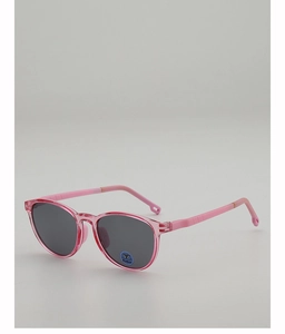 Détail latéral des lunettes de soleil enfant roses avec monture en résine et verres gris