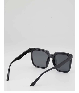Macro shot of stylish black square sunglasses showing temple detail and model number WF1239