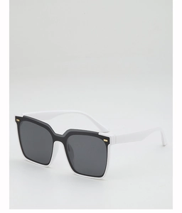 Detail view of square sunglasses with black and white frame and gold hinge accents