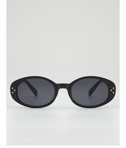 Front view of oval black sunglasses featuring golden cross metal rivets on the frame corners