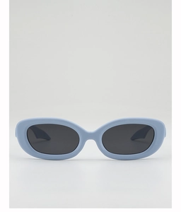 Front view of trendy light blue oval sunglasses with retro millennial aesthetic