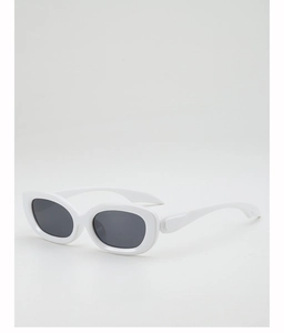 Close-up of white oval frame sunglasses with dark polarized lenses in minimalist style