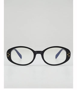 Detail of oval black frames with golden star rivets and polished finish for a retro look