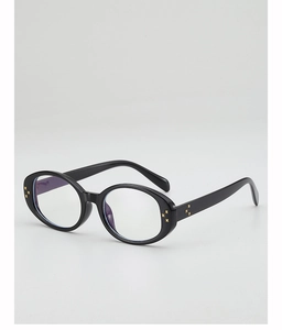 Detail of oval black frame glasses featuring gold cross rivets and anti-blue light lenses