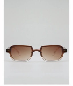 Detailed close-up of square gradient brown sunglasses with golden arrow metal accents