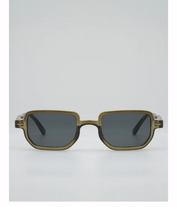 Detail of translucent olive green square sunglasses with gold metal hinge accents