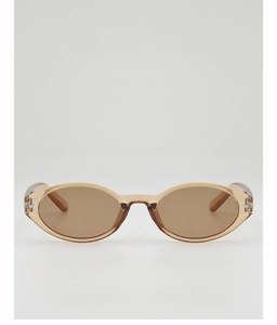 Close-up of oval leopard frame sunglasses with silver star studs and brown lenses