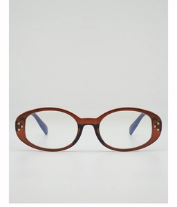 Detailed close-up of oval amber frames with golden cross rivets and blue-light lenses