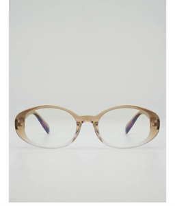 Close-up of oval tortoiseshell gradient frames with intricate gold cross accents