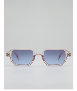 Detail of pink rectangular sunglasses featuring gradient lenses and gold arrow hinges