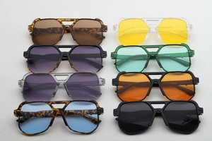 Collection of oversized aviator sunglasses with colorful ocean lenses and thick frames