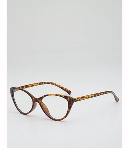 Detail view of cat eye glasses frame with stylish tortoiseshell pattern and clear lenses