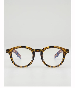 Detailed view of tortoiseshell round frames with vintage style and glossy finish