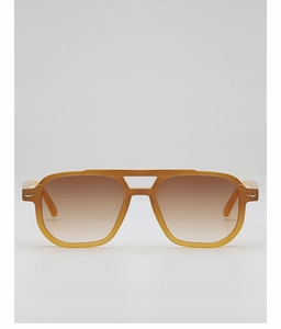 Detail view of amber translucent aviator frames with gradient brown lenses and metal studs