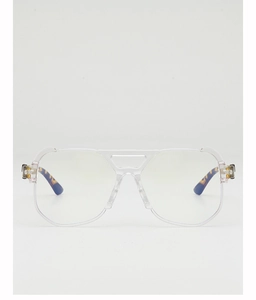 Detail of transparent aviator sunglasses featuring a classic double bridge and blue tortoiseshell legs