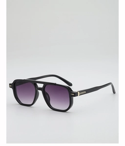 Detail of purple gradient lenses and gold arrow hinges on retro double bridge sunglasses