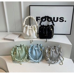 Women Bucket Bag PU Leather Drawstring Closure With Woven Handle And Gold Chain Strap Chic Versatile Handbag