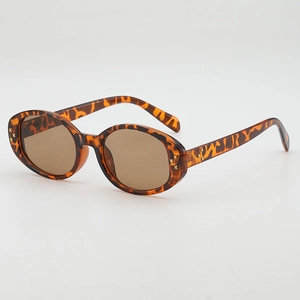 Retro oval tortoiseshell sunglasses with dark brown lenses and gold cross studs