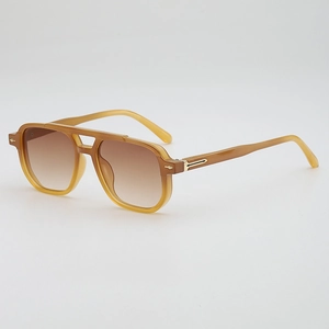Classic amber aviator sunglasses with double bridge and brown gradient lenses