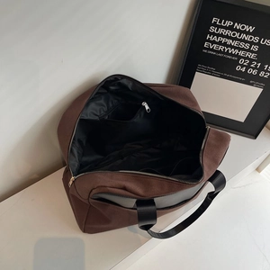 Large capacity tan tote bag with black handles shown from a 45-degree angle open view