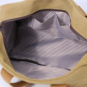 Sac bandoulière en toile d'hiver avec doublure rayée et poches de rangement