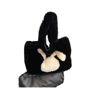 Black plush faux fur tote bag with white rabbit motif and soft top handle for winter