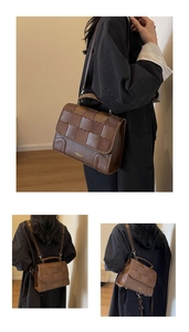 Detailed view of brown woven texture PU leather handbag with top handle and strap