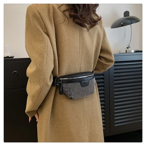 Fashionable black PU leather waist bag with silver metal rivets and fashion badge