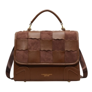 Retro brown leather and suede checkerboard handbag with crossbody strap and gold lettering