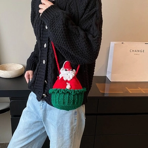 Cute Santa-themed knitted crossbody bag with red hat design and green base for girls